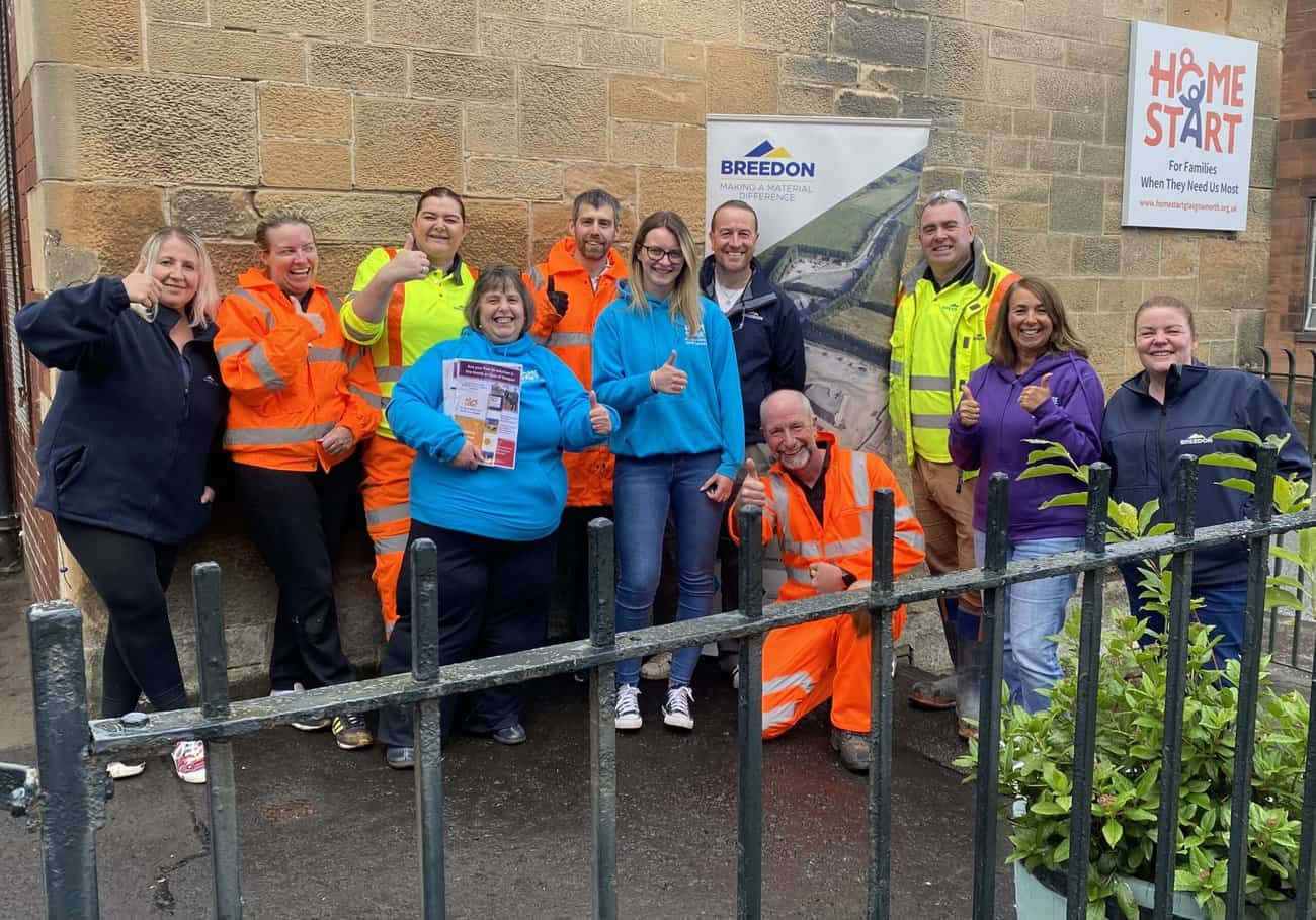 Image of team who have just cleared the outdoor play area