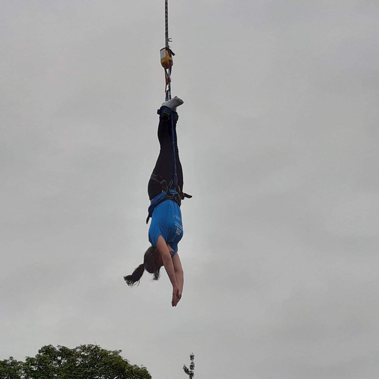 Image of Home-Start Student Volunteer completing a bungee jump.