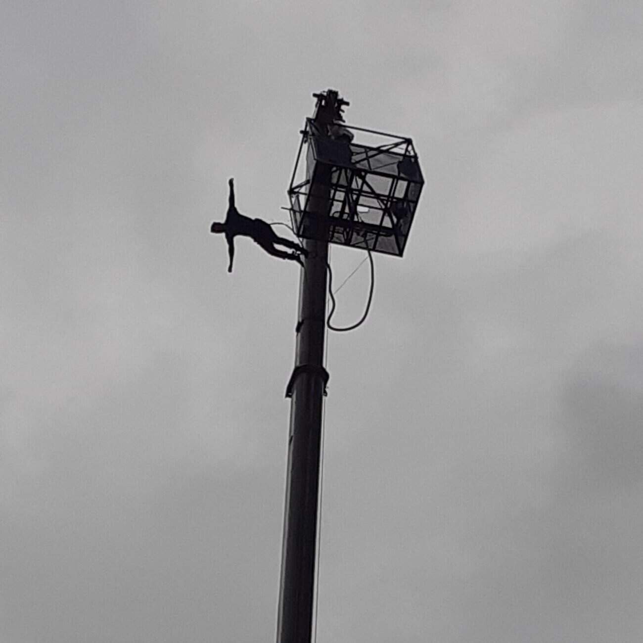 Image of Robert in mid air just starting his bungee jump.