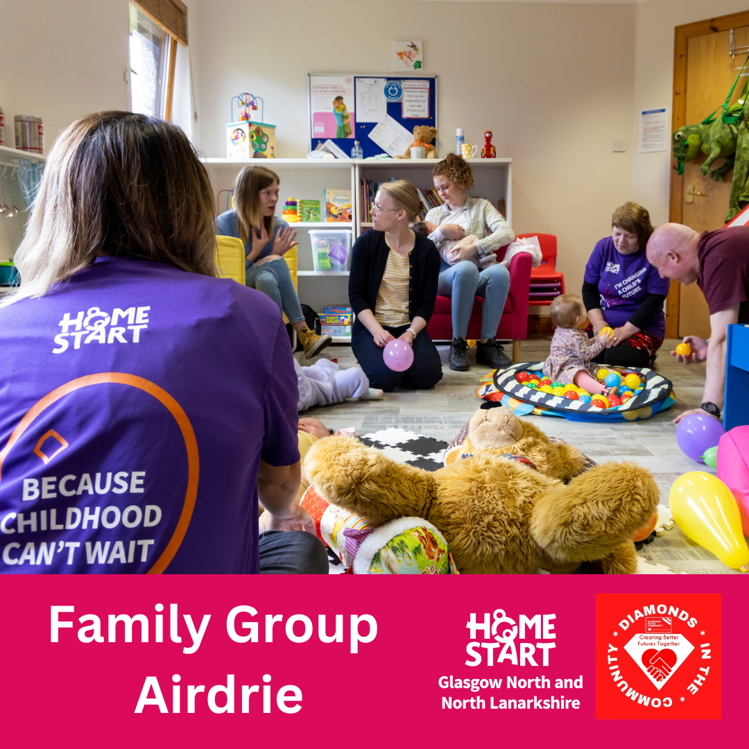 Image of families at a group with Home-Start Volunteers present too.