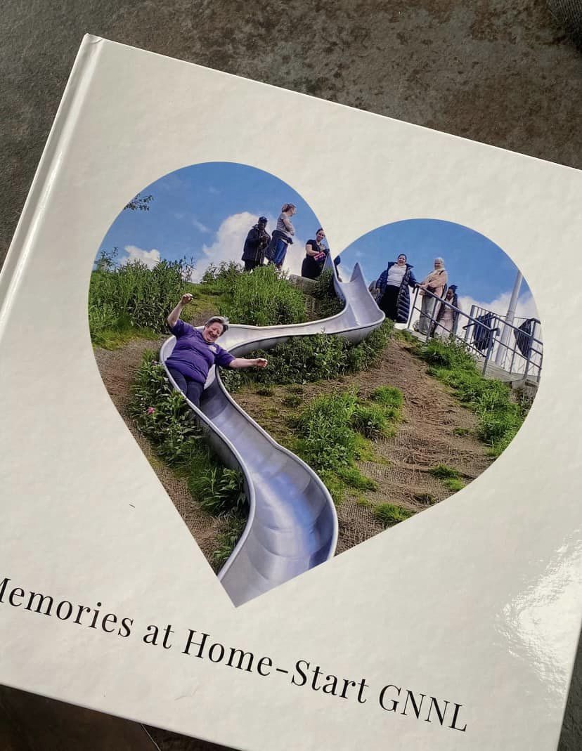 Image of a memory book for Mary, saying memories at Home-Start on the front.