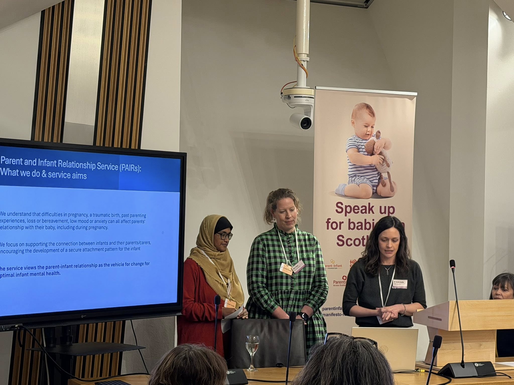 Image people standing talking at the Manifesto for Babies and Speak up for babies in Scotland campaign