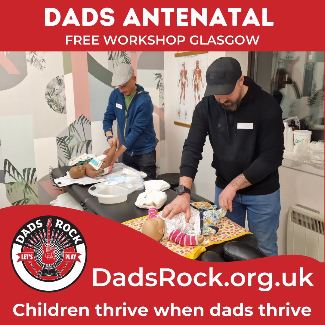 Image of a Dads Antenatal classes, some dads learning to change a nappy